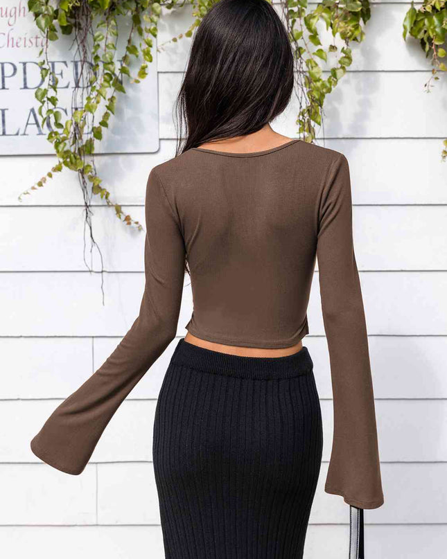 Lone Sleeve Cutout Zip Up Crop Top